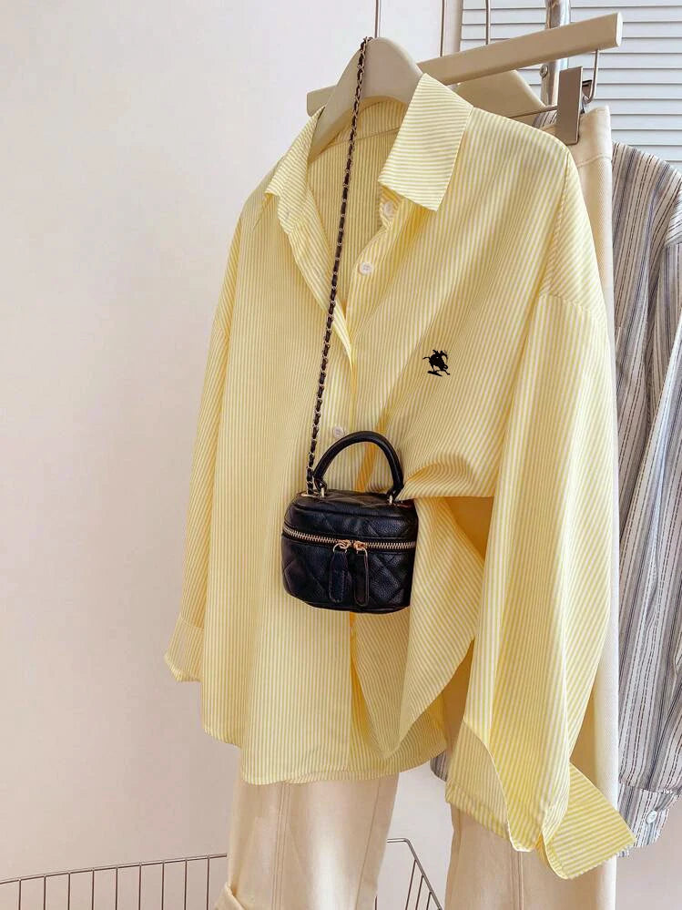 Elegant striped shirt with classic lapel, long sleeves and exquisite embroidery. Casual and versatile, great for work, dates, sh