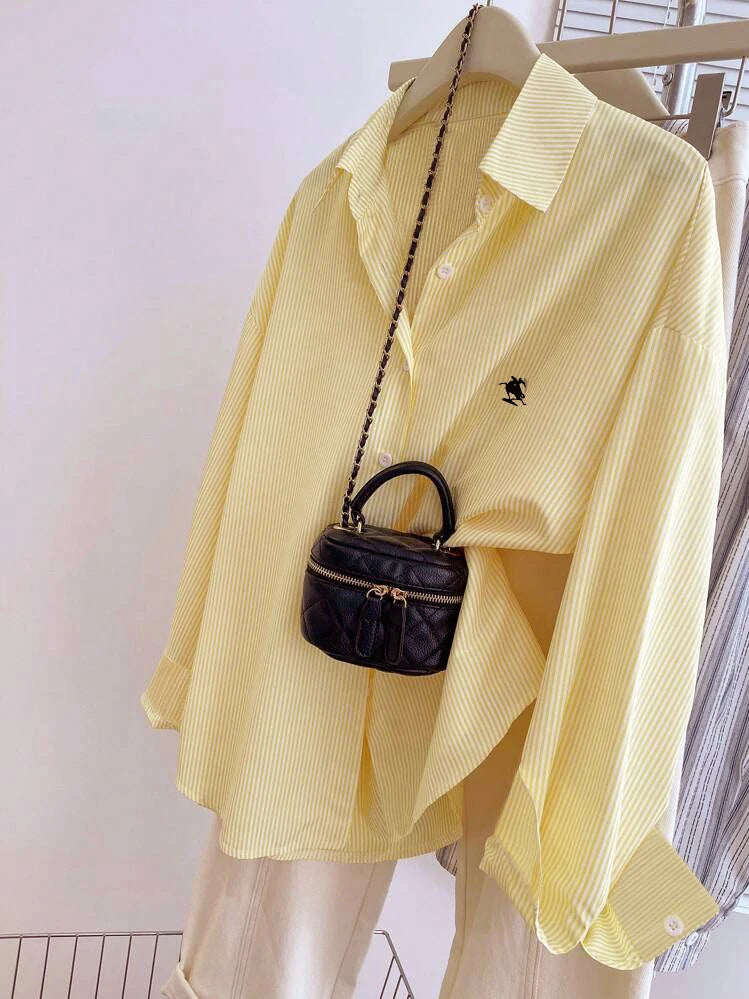 Elegant striped shirt with classic lapel, long sleeves and exquisite embroidery. Casual and versatile, great for work, dates, sh